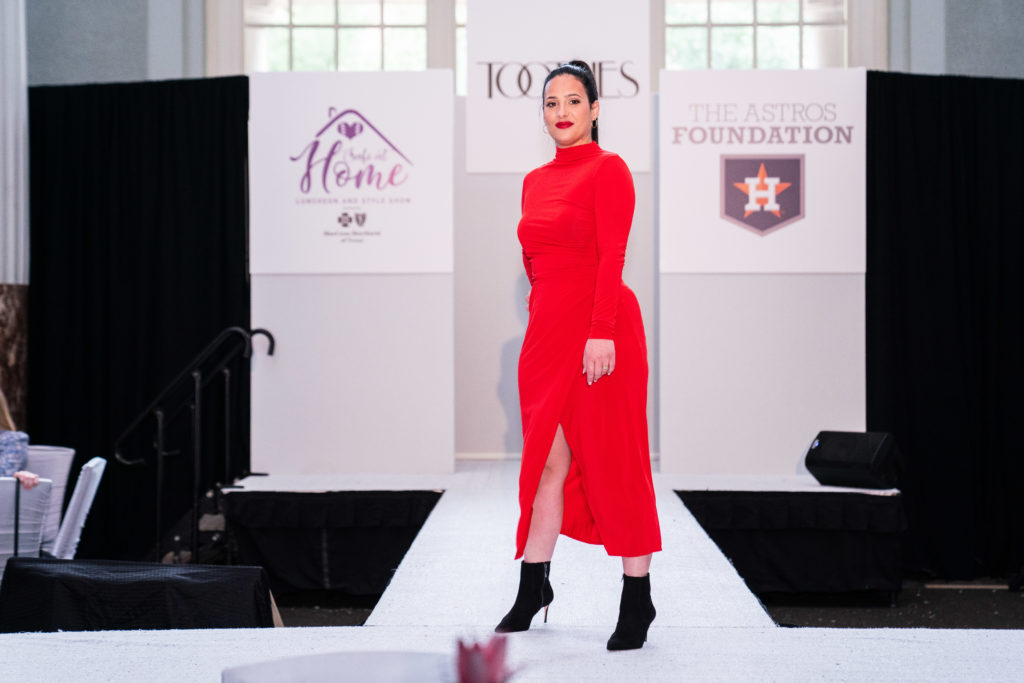 Dayara Diaz, the wife of infielder Aledmys Díaz, made red rock at the Astros Foundation Safe at Home luncheon.