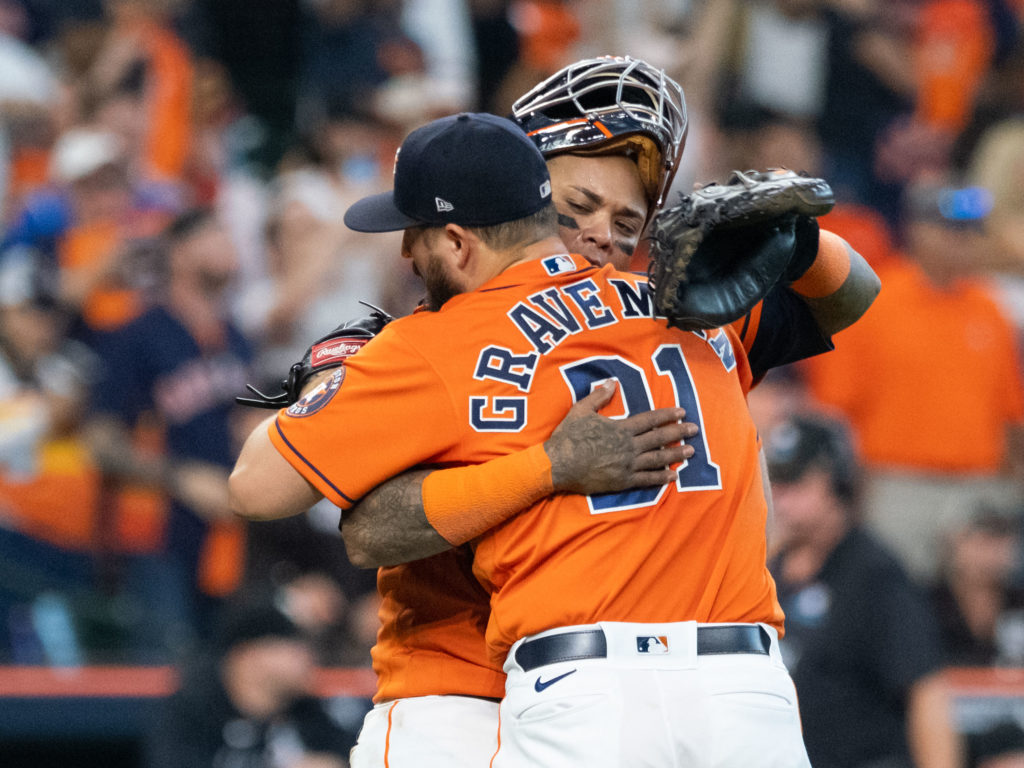 Astros catcher Martin Maldonado wants the best for very pitcher. Here, he gives Kendall Graveman some love. (Photo by F. Carter Smith)