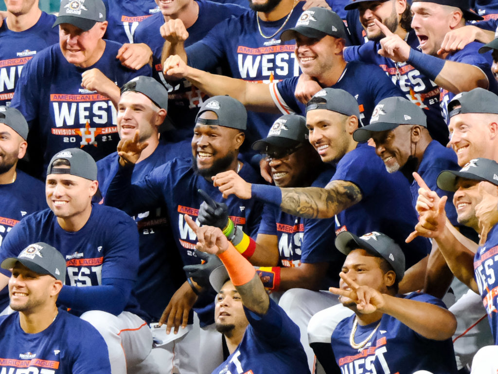 Another division title means another very fun team photo. And Dusty Baker and Carlos Correa were at the center of it all. (Photo by F. Carter Smith)