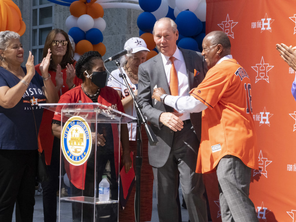 Astros owner Jim Crane and Houston Mayor Sylvester Turner shared an embrace. (Photo by F. Carter Smith)