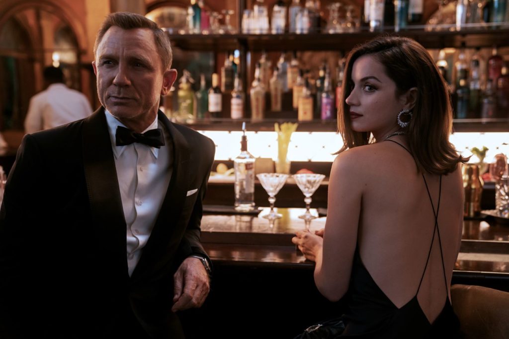 James Bond (Daniel Craig) and Paloma (Ana de Armas) Photo by Nicola Dove, MGM.