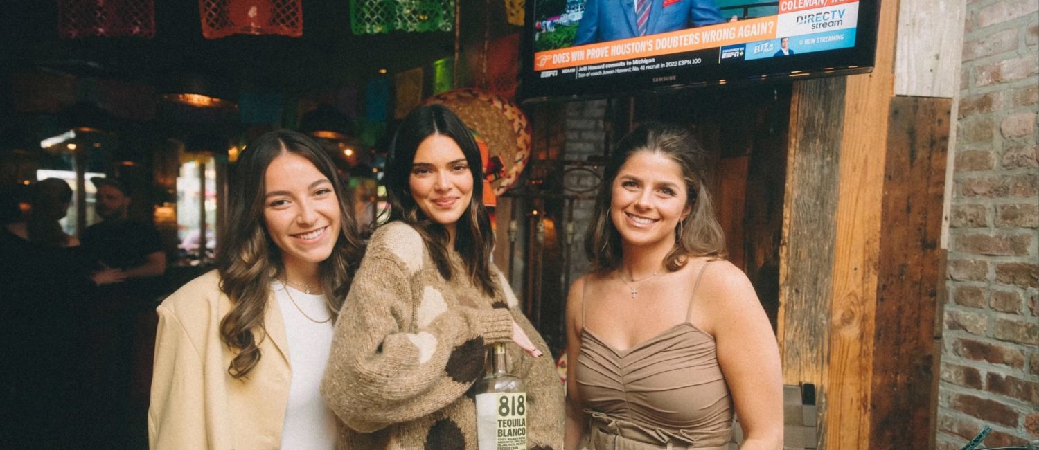 Kendall Jenner, center, and Blayne Feritta, right, and pal shake up Jenner’s 818 Tequila cocktails at Dos Caminos in New York’s meatpacking district. (Photo by Sophia Sahara)