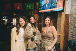 Kendall Jenner, center, and Blayne Feritta, right, and pal shake up Jenner’s 818 Tequila cocktails at Dos Caminos in New York’s meatpacking district. (Photo by Sophia Sahara)