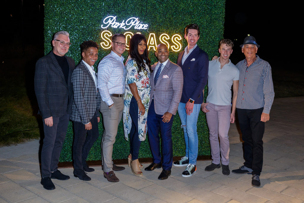 Park Place Arlington's Malcolm Gage poses with his guests at the launch party.