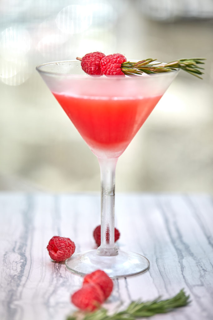 Ruth's Chris shakes up their Cosmo with  raspberry and rosemary. 