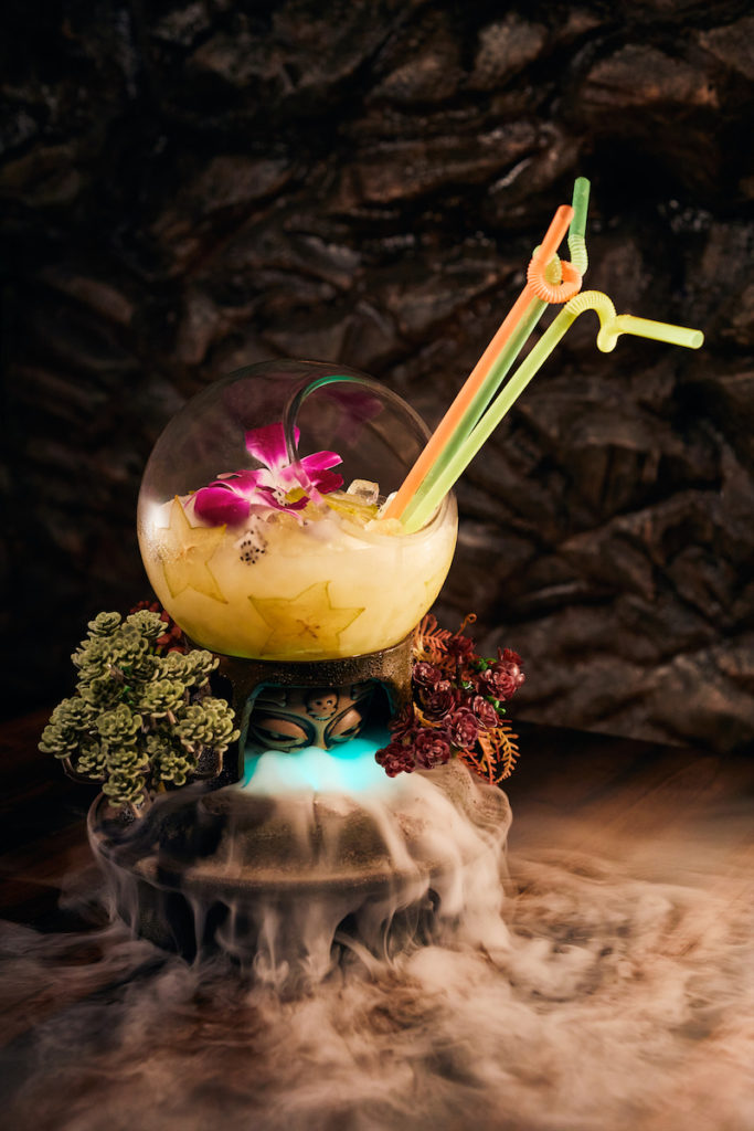 The S.O.S - Stranded on Saturn with gin, lemongrass shochu, starfruit, passion-fruit, miso-almond orgeat, and pholernum. (photo by Jody Horton)