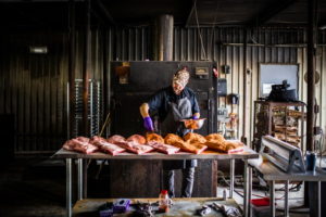 Pitmaster Jim Buchanan is bring the barbecue party back. (Photo by Robert Jacob Lerma)