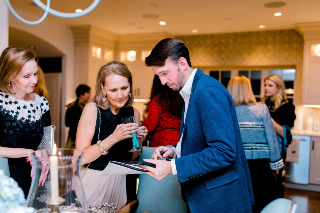 Ryan Haggerty sells Raffle Tickets during the Jewel Charity Ladies' Event  (Photo by Canon Sawyer / Canon Elizabeth Photography)