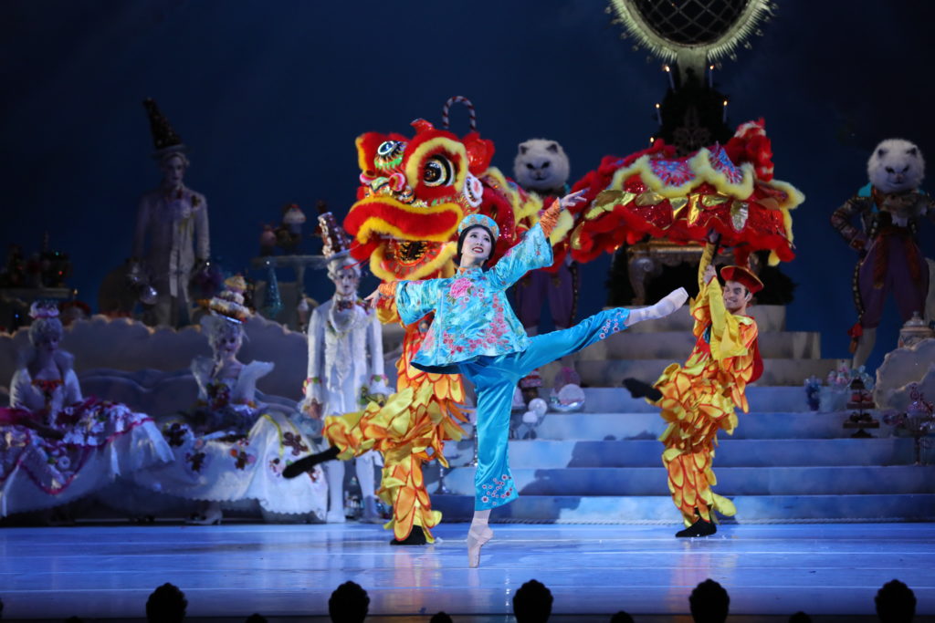 Houston Ballet former Principal Nozomi Iijima in 2019 with artists of Houston Ballet in Stanton Welch’s The Nutcracker. (Photo by Amitava Sarkar, Courtesy of Houston Ballet)