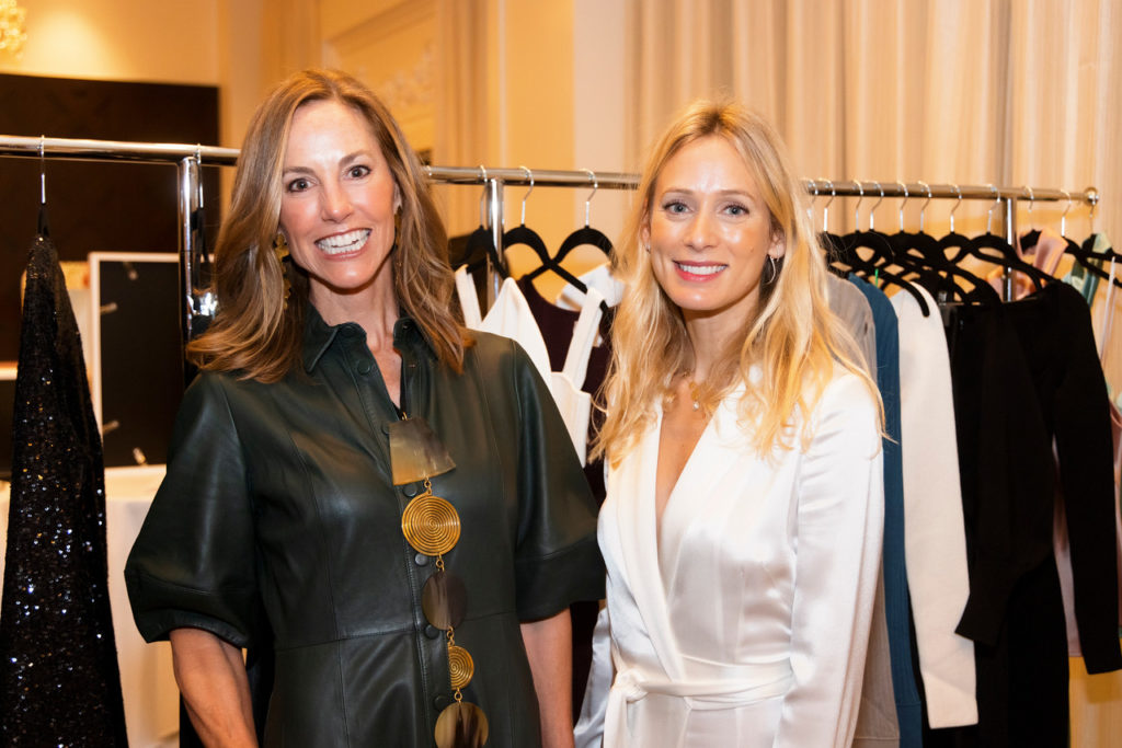 Teresa Hubbard and Katherine Holmgren of Galvan London at the Desert Rose Fashion Show and Luncheon Patron Party at River Crest Country Club on November 9, 2021. (Photo by/Sharon Ellman)