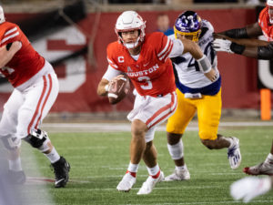 Clayton Tune gives UH football a threat on the ground as well as with his arm. (Photo by F. Carter Smith)