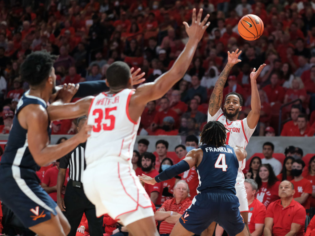 Fabian White Jr. is ready for Kyler Edwards' entry pass. (Photo by F. Carter Smith)