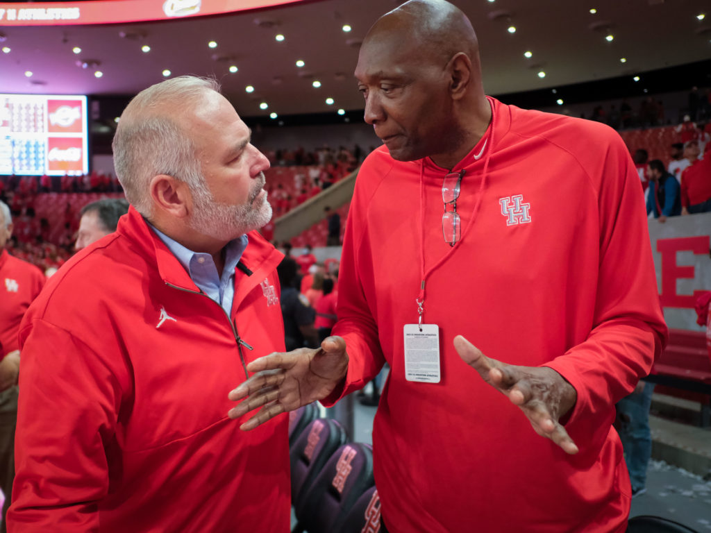 Houston athletic director Chris Pezman and UH great Elvin Hayes share a moment. (Photo by F. Carter Smith)