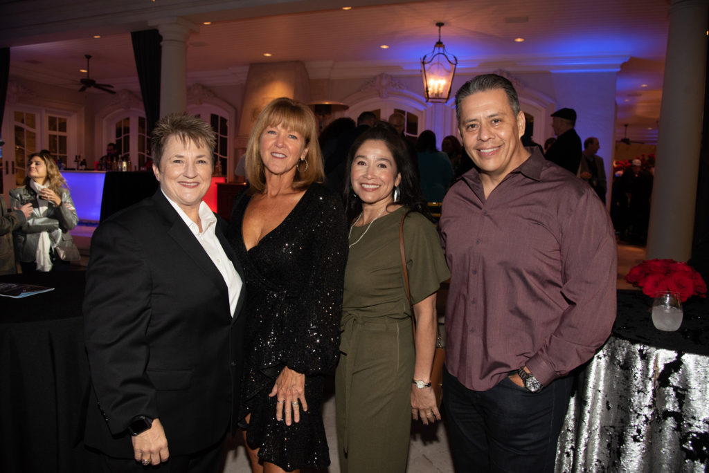 Fire Marshal Laurie Christensen, Liz Christensen, Carolina Peña, Chief Samuel Peña; Photo by Alexanders Fine Portrait Design
