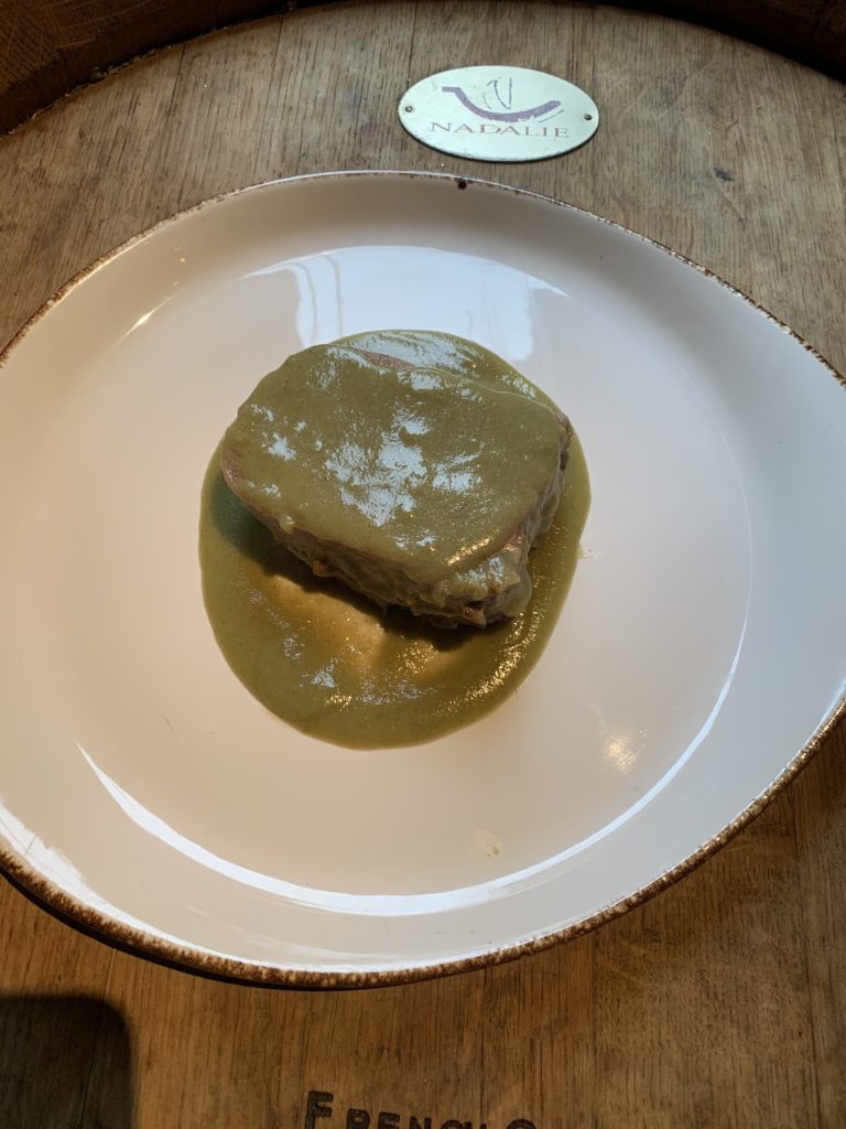 This is a fresh green Mole Verde with grilled Chicken. the green mole is one of the famous seven moles of Oaxaca. The sauce is usually thick and is made with tomato, chile de agua or serrano, garlic, cloves, pepper, parsley, coriander, epazote, holy grass and corn dough; sometimes includes chopped vegetables like green beans and chayotes. (Photo by Laurann Claridge)