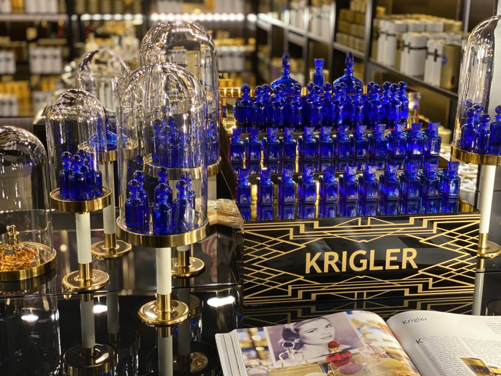 The cobalt blue antique bottles  represent the origin of Krigler and are a part of the brand signature dating from the 1920s.