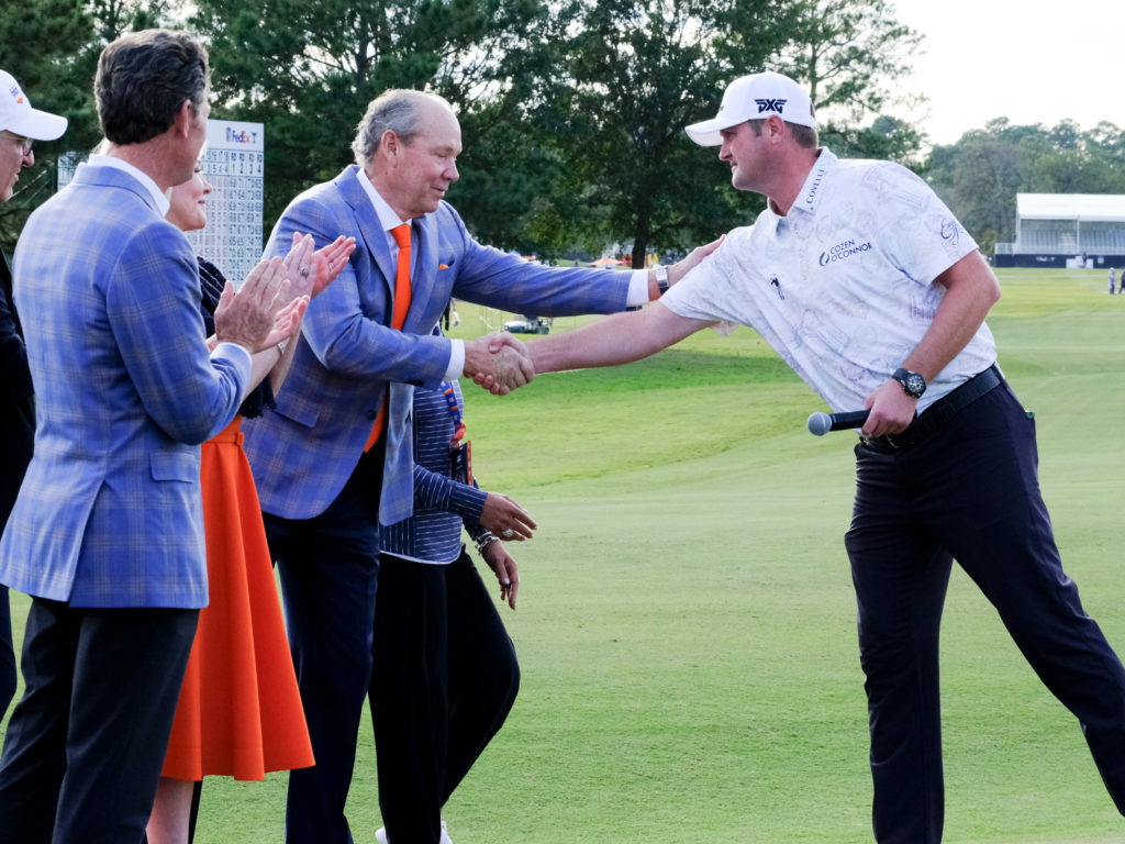 Jim Crane congratulates Jason Kokrak on his Houston Open win. (Photo by F. Carter Smith)