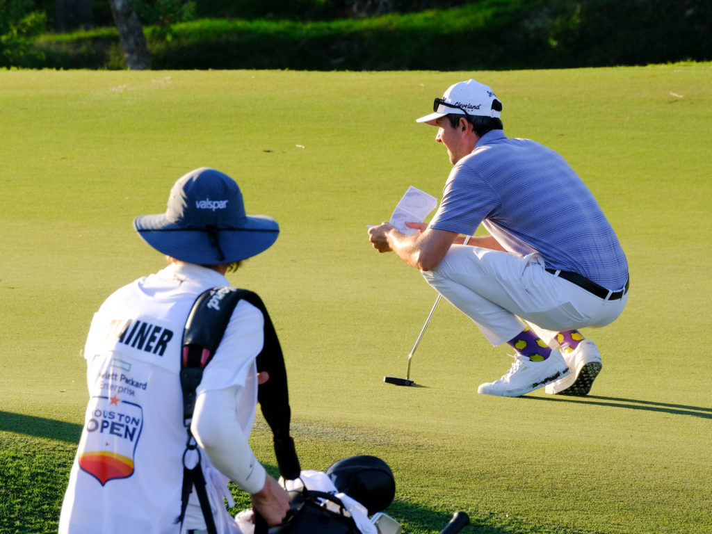 Martin Trainer studies the green. Memorial Park is a course that can challenge the pros. (Photo by F. Carter Smith)