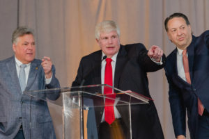 Paddles up with Gala Chairs Neil Leibman, John Eddie Williams, John McIntyre (Photo by CatchlightGroup.com)