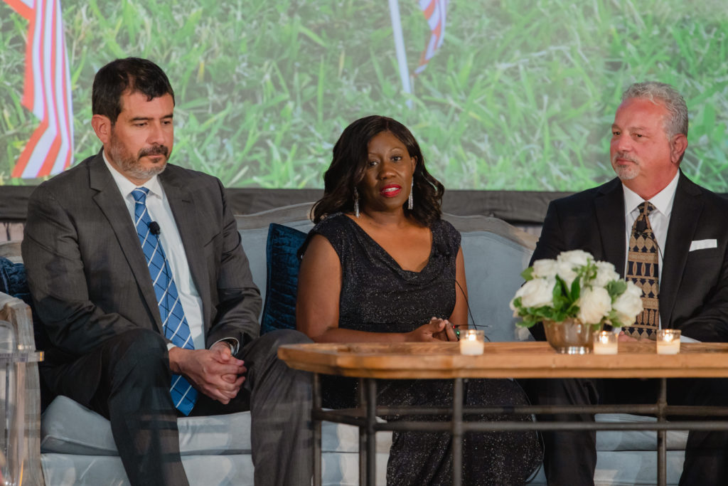 The poignant faces of surviving family members Paul Castro, Theresa Seck, Chuck Cook (Photo by CatchlightGroup.com)
