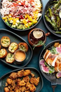 _Truffle Mac and Cheese Bites_Boneless Wings with Lemon Pepper Butter and Honey Drizzle_Cobb Salad_Pan Roasted Shishito Peppers_Chicken Caesar Salad