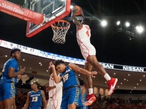 UH guard Taze Moore still boasts some serious hops to go with his long range shots. (Photo by F. Carter Smith)