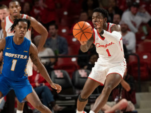 University of Houston Cougars men’s basketball team opened their 2021-2022 season with an overtime victory over the HofstraPride, complete with the presentation of a banner commemorating their trip to last season’s Final Four, Tuesday night at the Fer