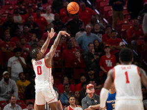University of Houston Cougars men’s basketball team opened their 2021-2022 season with an overtime victory over the HofstraPride, complete with the presentation of a banner commemorating their trip to last season’s Final Four, Tuesday night at the Fer