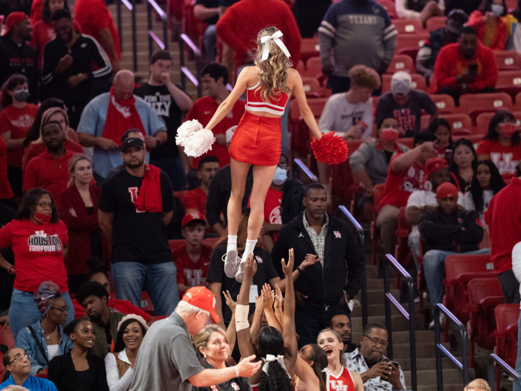 UH basketball is worth jumping up into the air about. (Photo by F. Carter Smith)