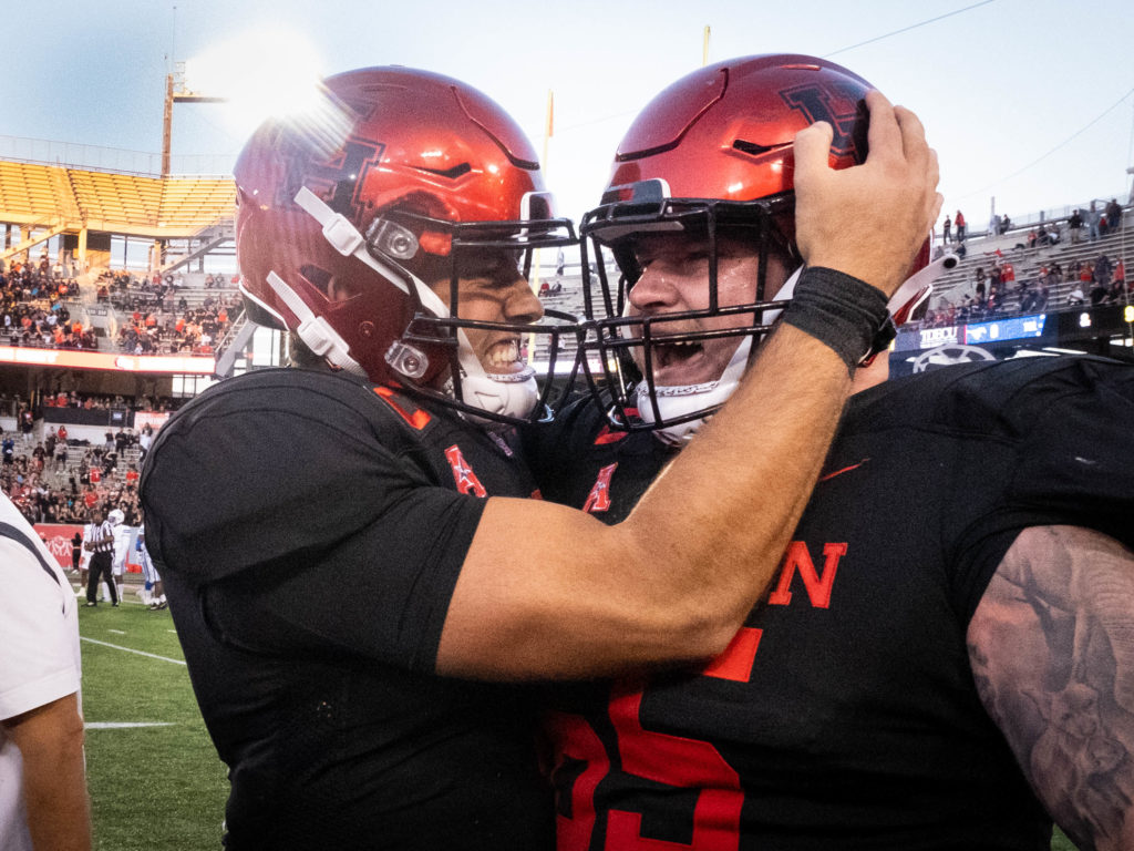 UH quarterback Clayton Tune always tries to give his offensive line a lot of love. (Photo by F. Carter Smith)