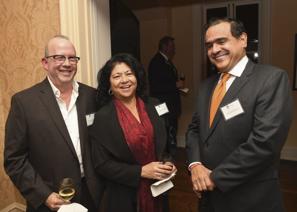 Tim Martinez, Jani Lopez, Jacob Monty at the Mayor's Hispanic Advisory Board annual holiday reception. (Photo by Vicky Pink)