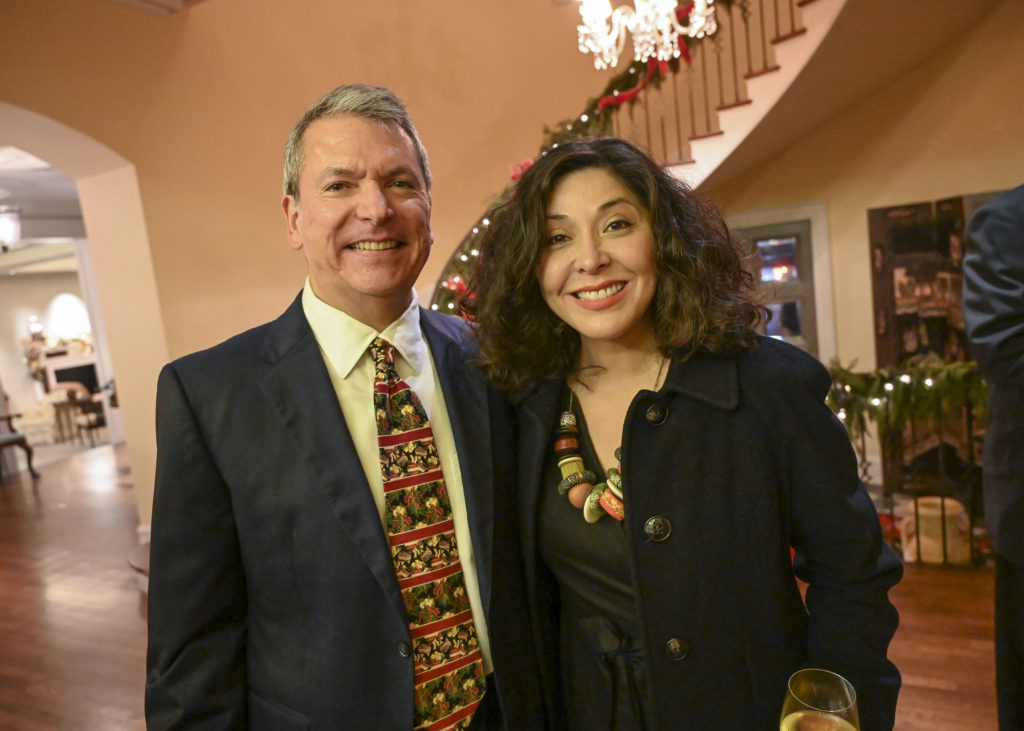Roland Garcia, Juliet Stipeche at the Mayor's Hispanic Advisory Board annual holiday reception. (Photo by Vicky Pink)