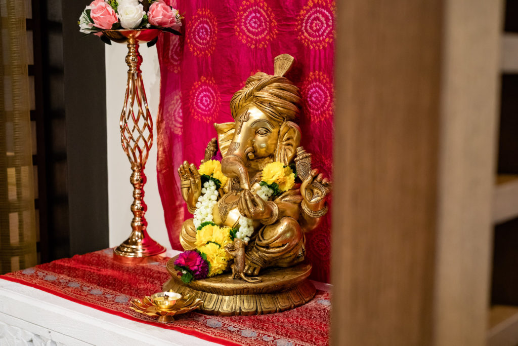 This beautiful brass sculpture stands as an altar to Lord Ganesh at Mahesh's Kitchen. Photo by Kristen Gilliam.