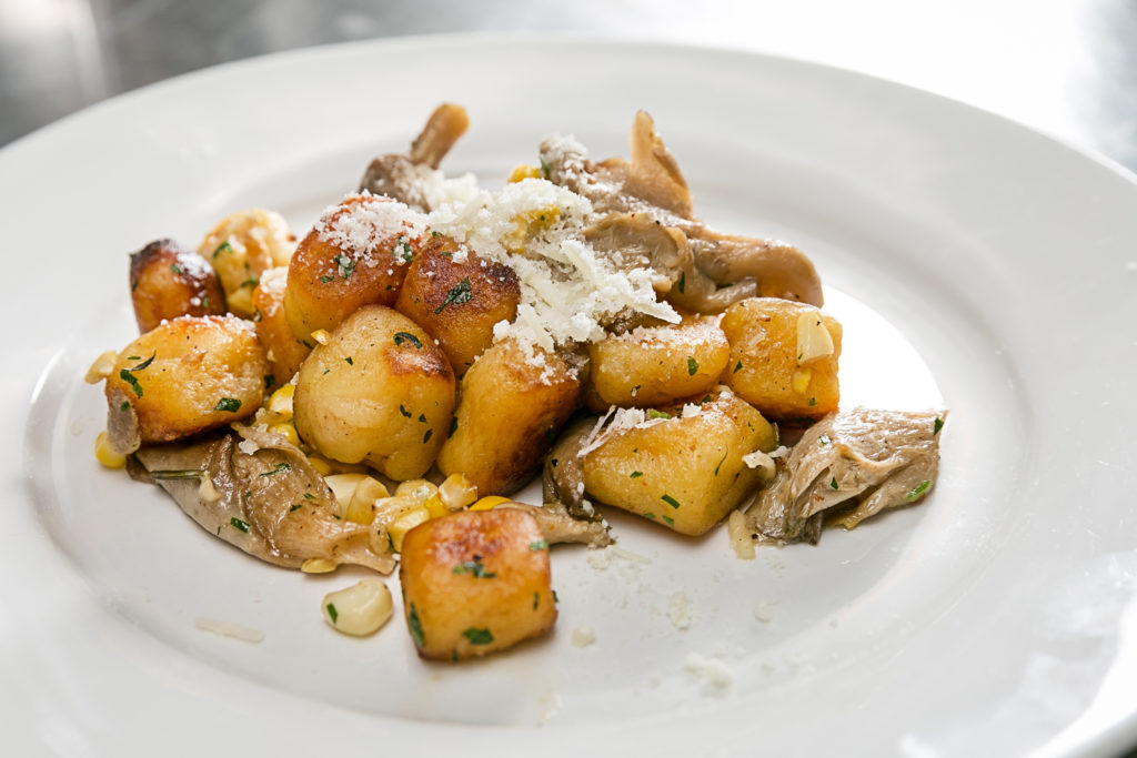 Ostia chef Travis McShane presented gnocchi with corn as the third course at the Urban Harvest Sunday Supper. (Photo by Emily Jaschke)