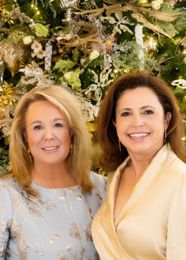 Event Chairs Lauri Lawrence and Liz Fleischer at the Texas Ballet Theater Caren Koslow Fashion Show and Luncheon at Bass Hall in Fort Worth, Texas on December 9, 2021. (Photo by/Sharon Ellman)