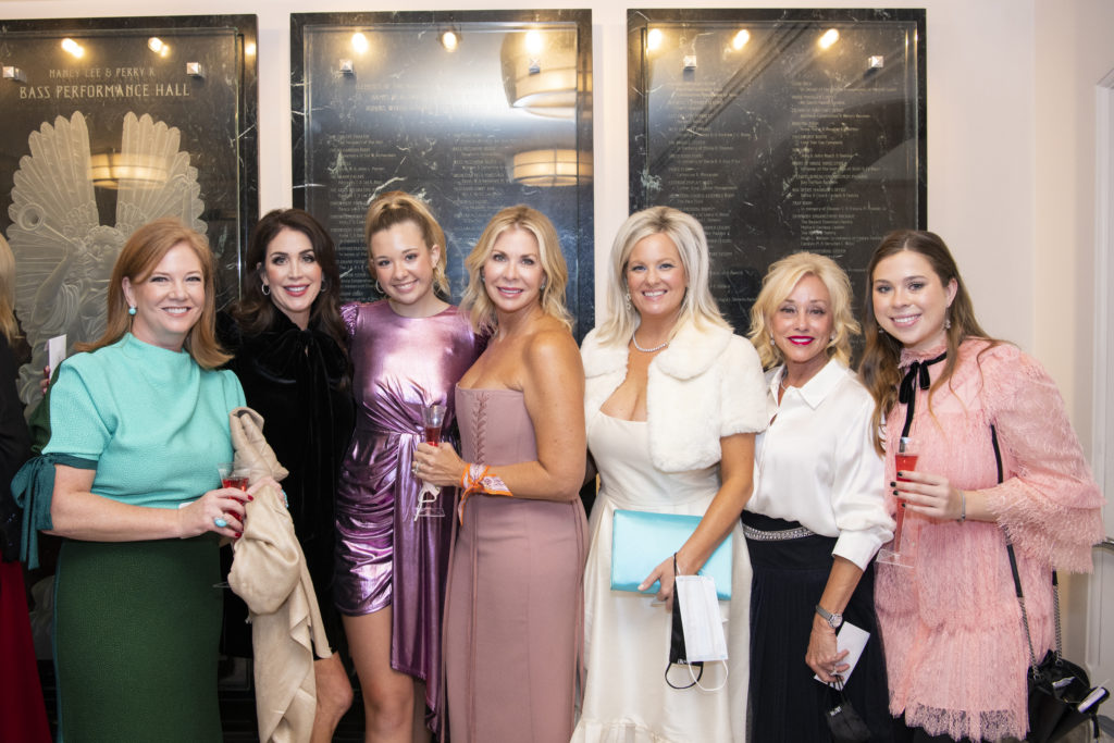 Jennifer Williamson, Kelly Christensen, Clementine Miller, Maribeth Miller, Michelle Moncrief, Jan McKee and Alissa Leaderer at the Texas Ballet Theater Caren Koslow Fashion Show and Luncheon at Bass Hall in Fort Worth, Texas on December 9, 2021. (Photo by/ Ellman Photography)