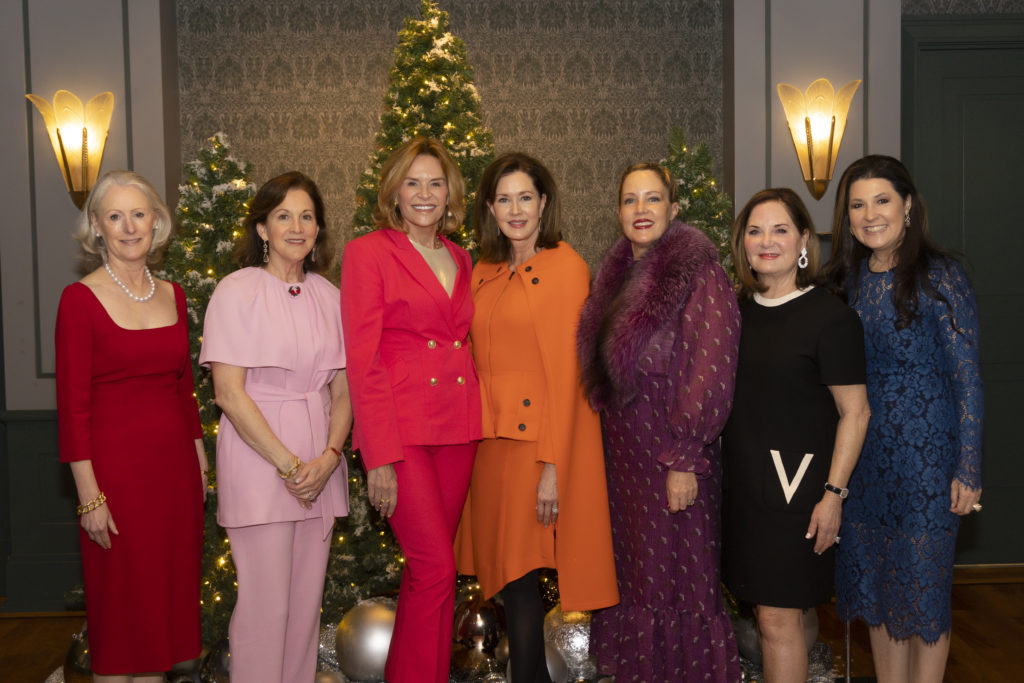 Susan Butt, Carolyn Hudson, Lisa Gupton, Dana Porter, Margaret Solomon, Cynthia Hickman, and Capera Ryan at the Texas Ballet Theater Caren Koslow Fashion Show and Luncheon at Bass Hall in Fort Worth, Texas on December 9, 2021. (Photo by/Sharon Ellman)