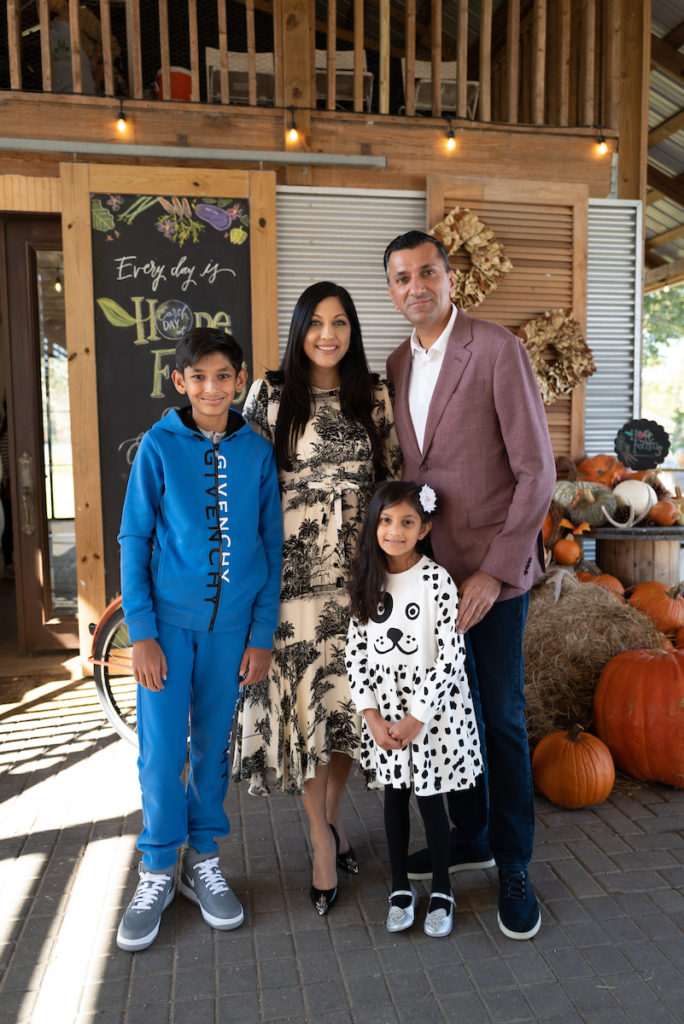 Fashion in the Fields luncheon chairs Dr. Sippi & Ajay Khurana with their children Shaan and Seva at Recipe for Success Foundation's Hope Farm (Photo by Daniel Ortiz)