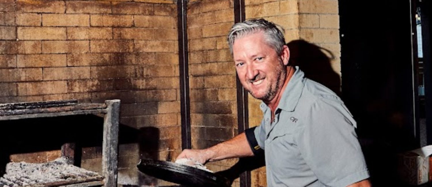 Chef Tim Love has things smoking on the hearth.
