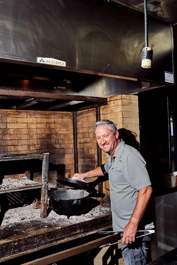 Chef Tim Love has things smoking on the hearth.
