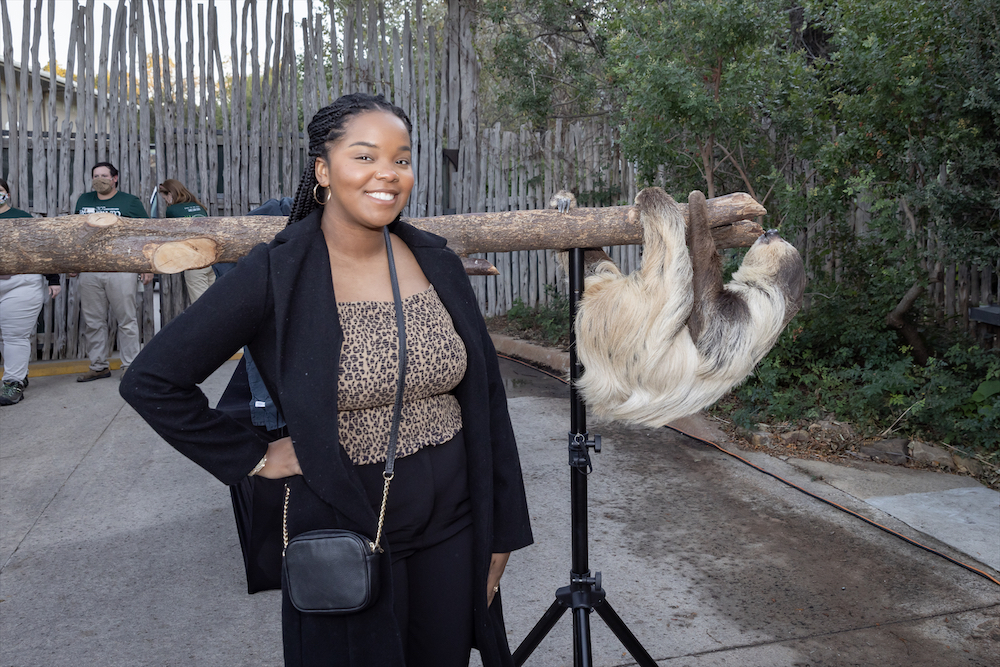 Lauren Dillard with a sloth (Photo by Thomas Garza Photography)