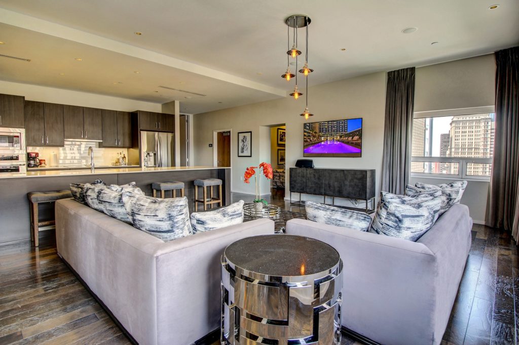 Luxurious penthouse living and kitchen quarters in the residential suites at The Statler.