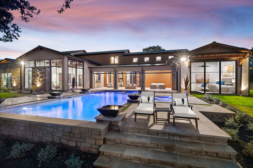 The sun-soaked main house brings the striking outdoors in. (Photo by Zach Spross Photography for Douglas Elliman)