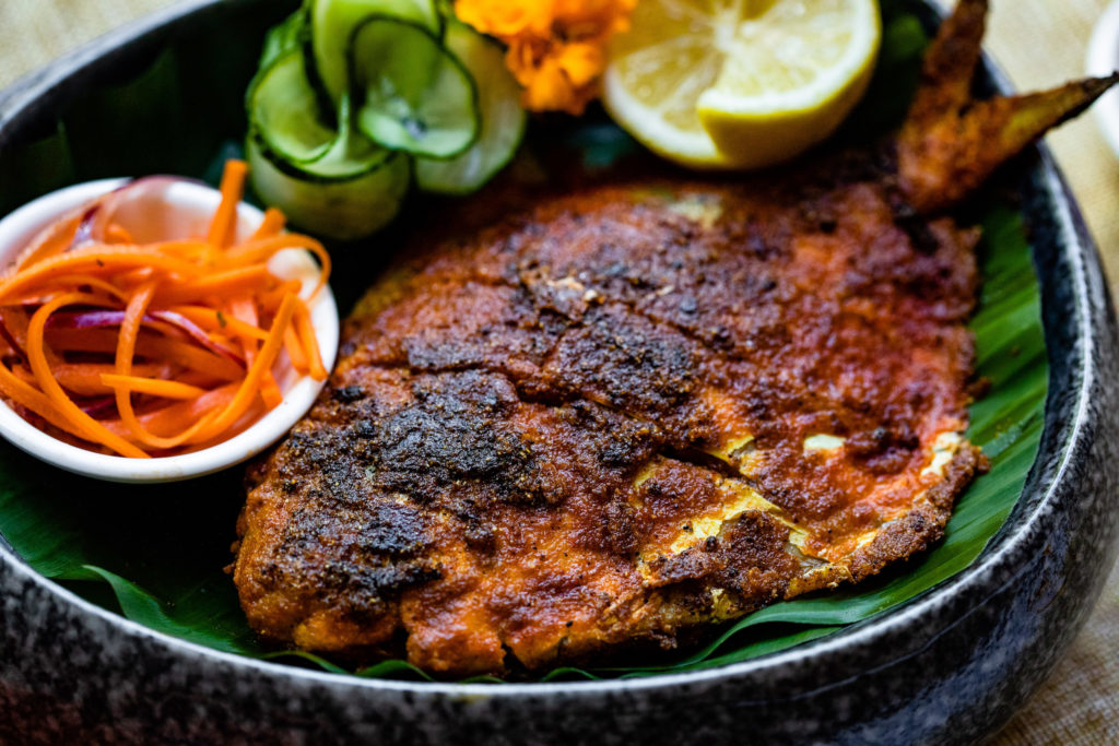 Pictured the spicy whole pomfret fish appetizer at Mahesh's Kitchen. Photo by Kristen Gilliam. 