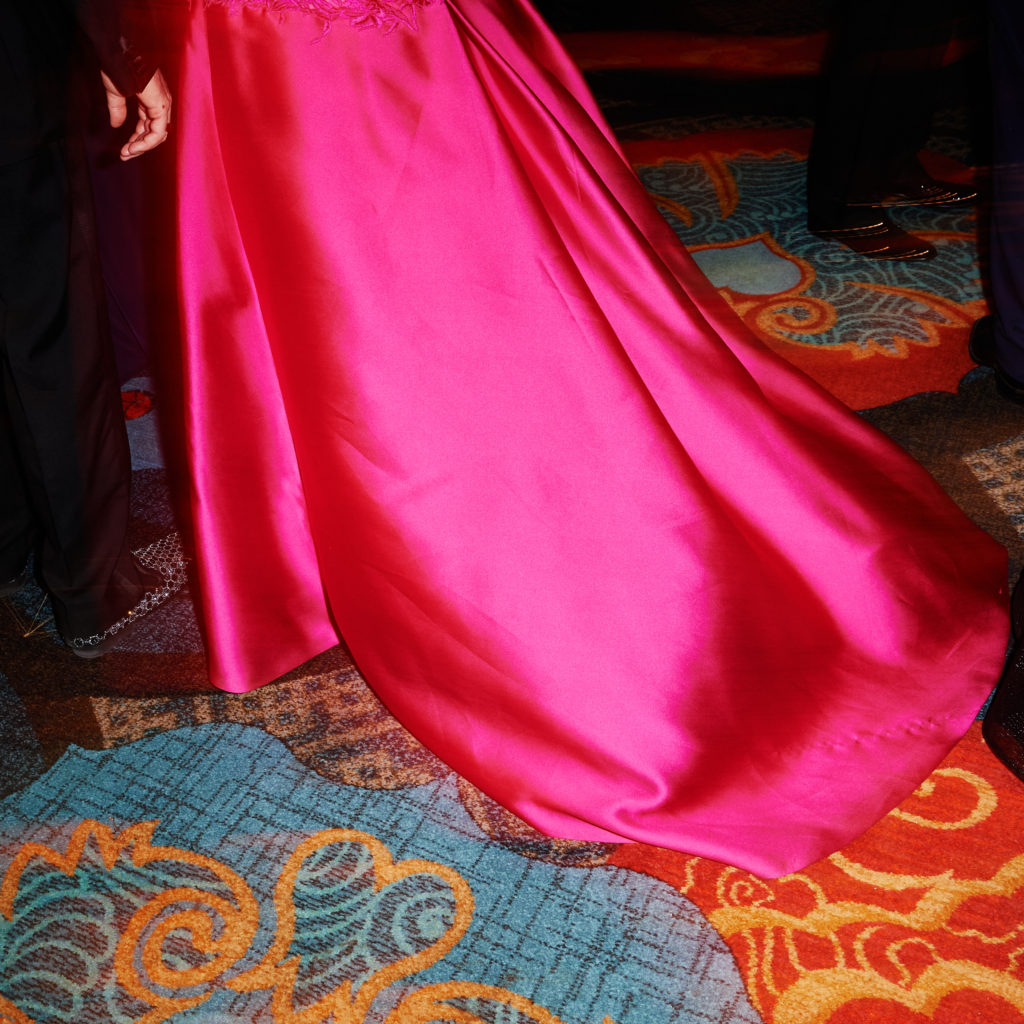 One of the few occasions where a dress with a train is de rigueur. (Photo by Jonathan Zizzo)