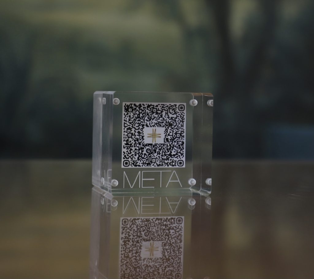Metagolden's signature Canetti Lucite display cube frame to display art via QR code