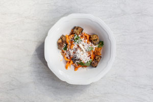 A famous dish from Sicily, Casarecce Alla Norma ($22), is a scroll-like pasta that holds the weight of fried eggplant chunks in a spicy tomato sauce tossed with shaved ricotta salata.(Photo Jenn Duncan)