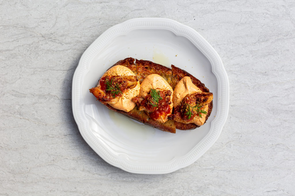 Start your meal with Crostini Di Gamberi arrabiata ($16), perfectly spiced crispy shrimp enrobed with a tomato sauce, and laid over a creamy bed of smoked labneh. (Photo Jenn Duncan)