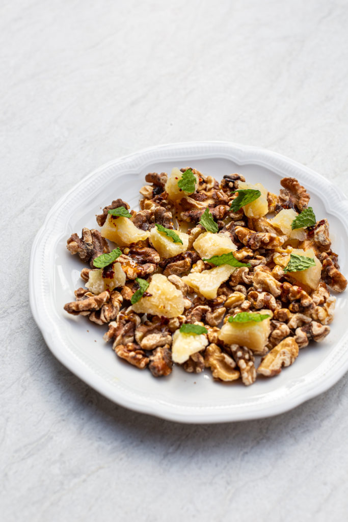 At Trattoria Sofia chef LJ Wiley created a simple but tasty app to pair with a cocktail: toasted walnuts with chunks of parmesan, topped with spiced honey. (Photo Jenn Duncan)