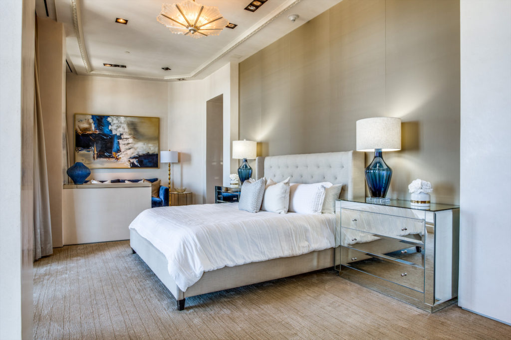 A serene master bedroom in the Ritz-Carlton penthouse. (Photo by Shoot2Sell for Douglas Elliman)